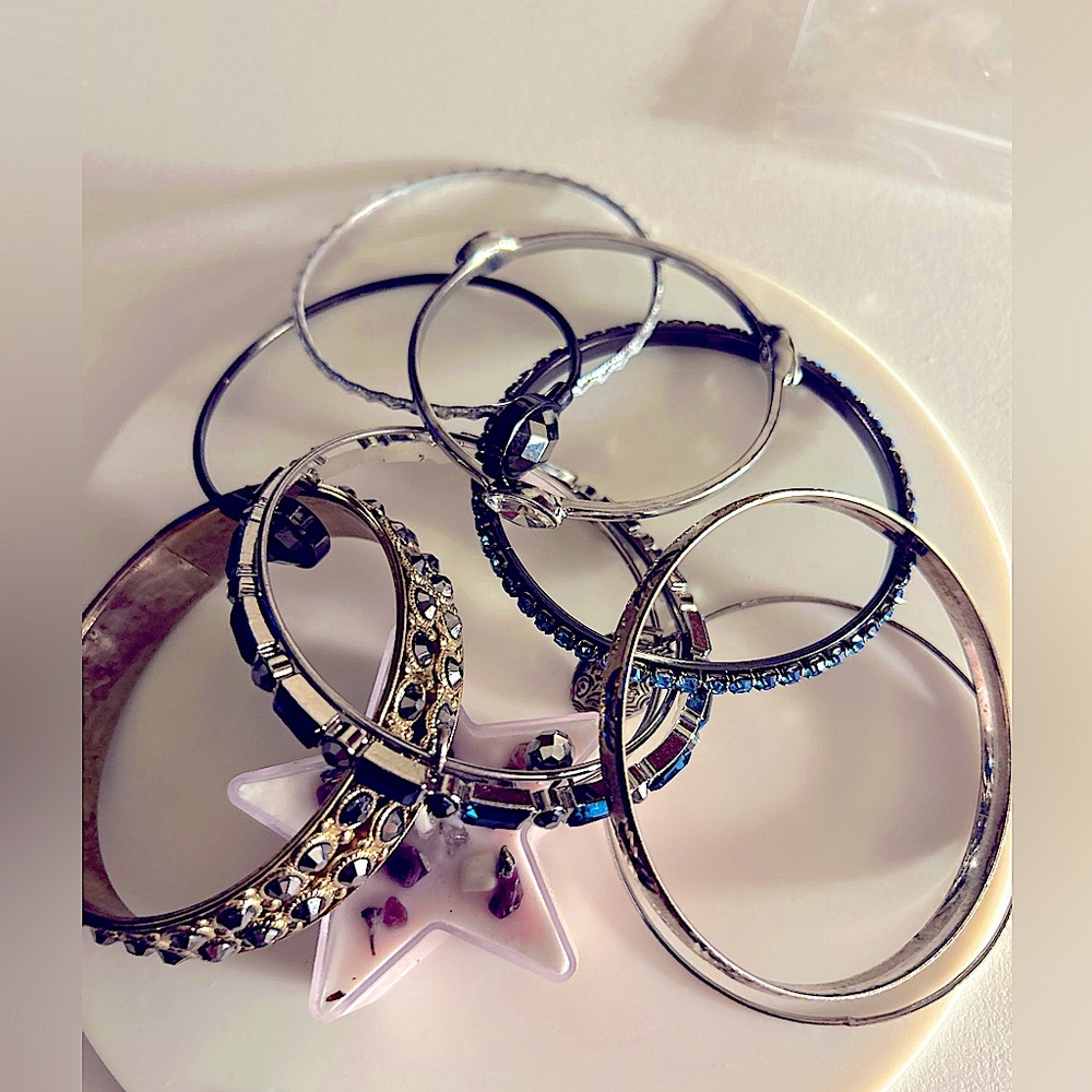 7- bracelets in silver, gold bangle w blue rhinestones, crystal, hematite